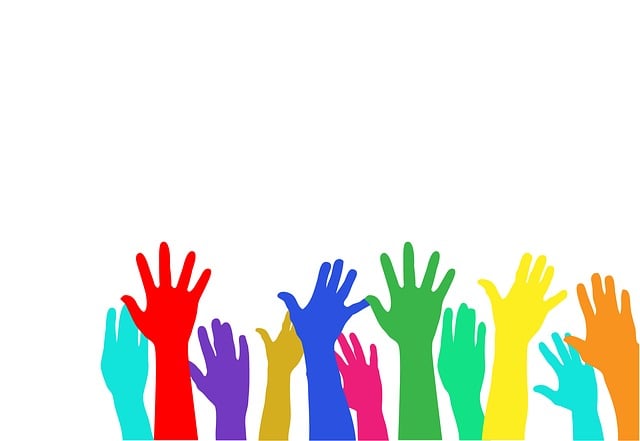  Picture of hands in varying colors against a white background